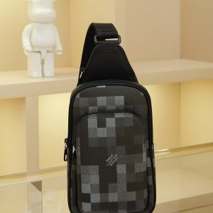 AVENUE Shoulder Bag crafted from Pharrell Williams' reimagined Damoflage Black coated canvas, blending the designer's avant-garde vision with the brand's heritage creativity. Features a pixelated camouflage-inspired Damier pattern and an "intelligent" shoulder strap designed for comfortable wear on either the left or right shoulder. Dimensions: 20x31x10cm